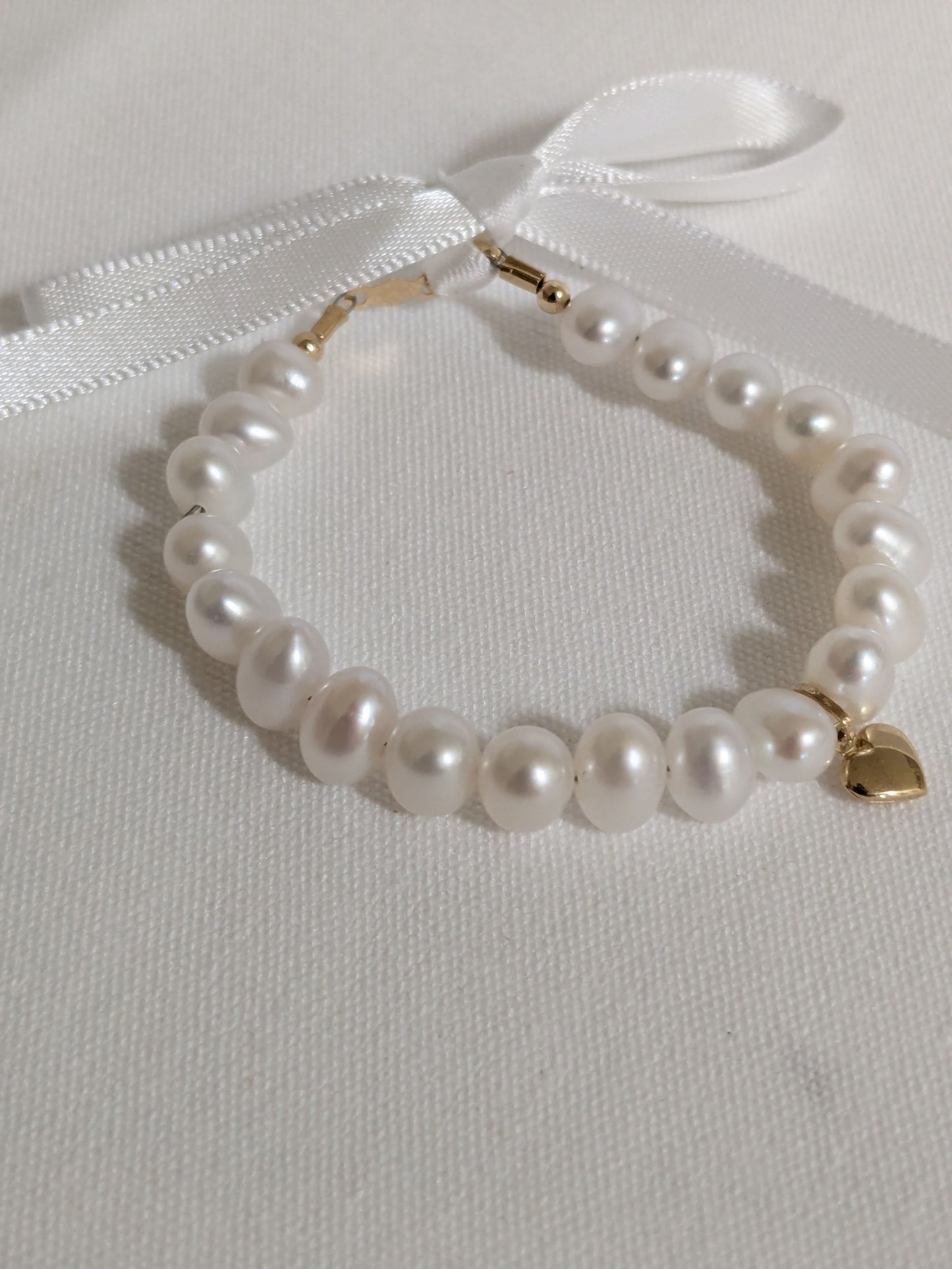 14KT Pearl Bracelet with puffed gold heart