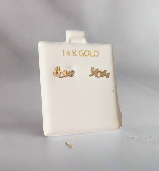 Gold earrings pair of earrings Love and You are separately featured 1 for each ear. The backs are silicone with 14 KT gold.