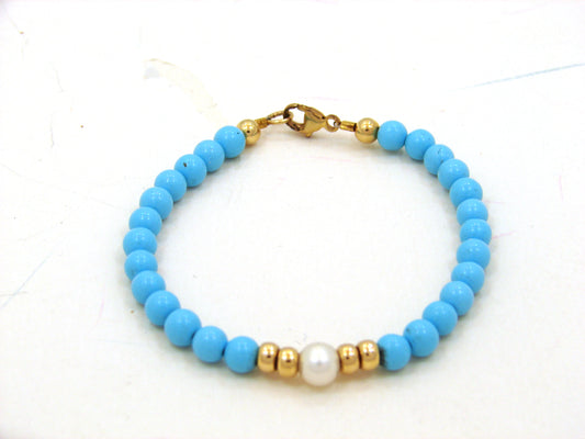 14 KT Princess bracelet 2 roundels  on each side of a center pearl with turqoise