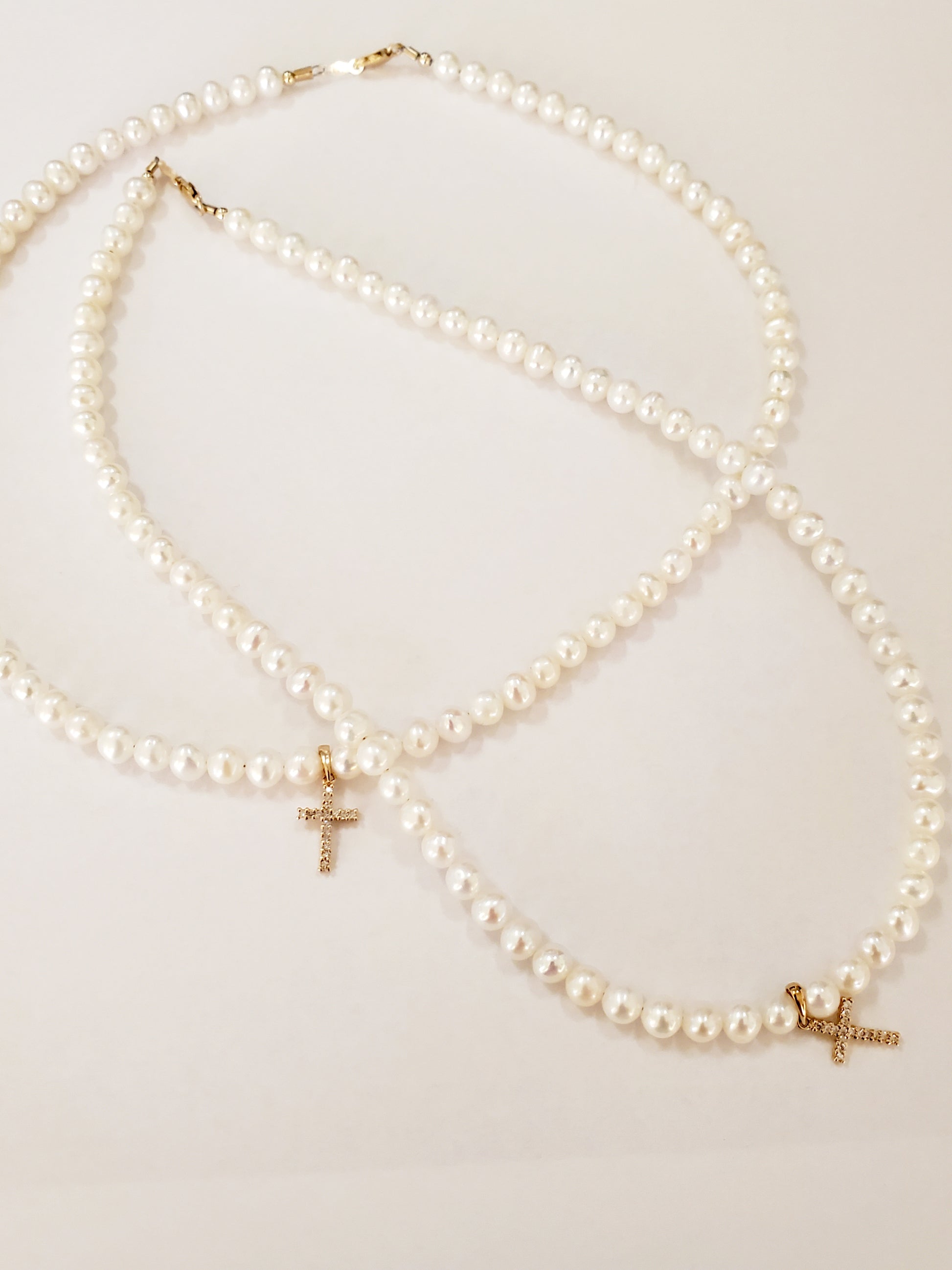 14 Kt Diamond cross on freshwater pearl necklace yellow gold 15 inches