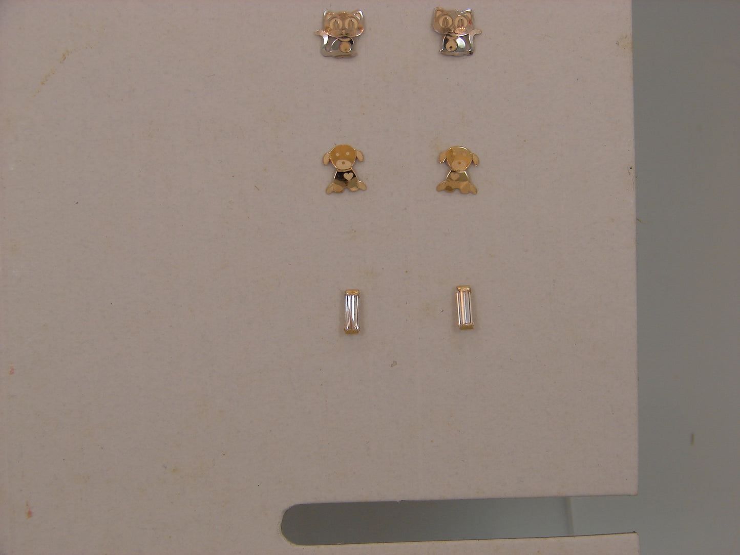 14 KT Tiny Baguette gold screw back earrings