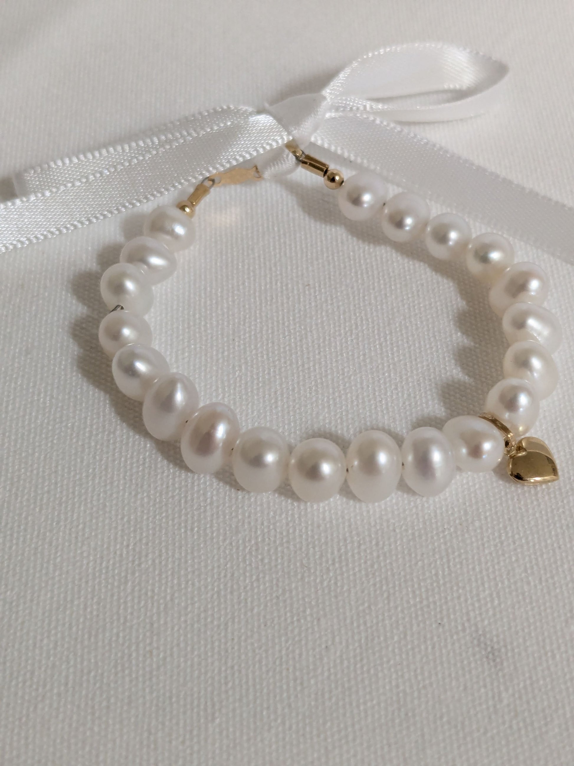 14 KT Pearl bracelet with puffed heart charm