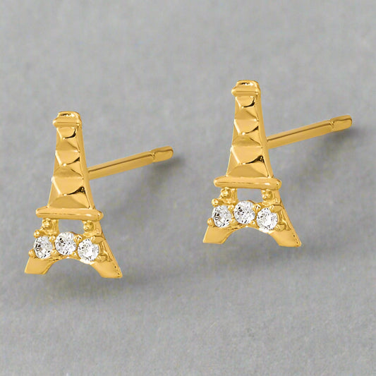 Gold Eiffel Tower earrings with clear stones on a white background