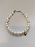 14 KT Gold Mindy Harris Pearl Bracelet with Puffy heart 7mm charm  finished with lobster clasp and polished beads
