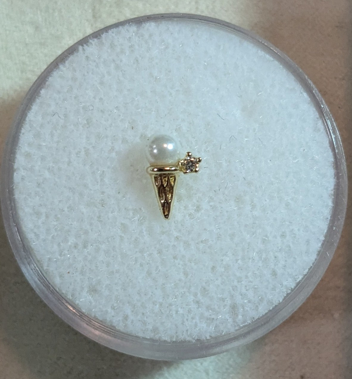 Single gold cone with pearl top and diamond cartilage earring single 8mm. 