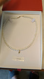 14 KT Children's Pearl cross necklace