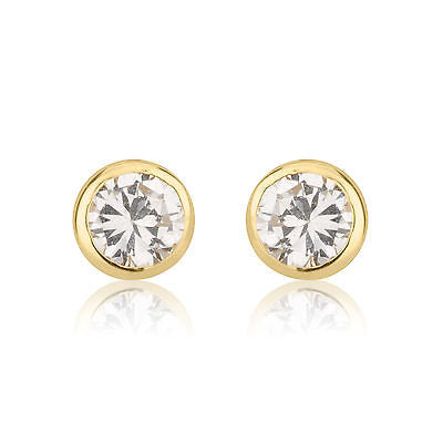 14 KT Baby CZ's screw back earrings Yellow